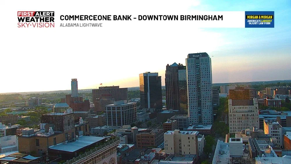 First Alert Sky Vision webcam shot of downtown Birmingham at sunrise, branded 'CommerceOne Bank, Downtown Birmingham, Alabama Lightwave.'