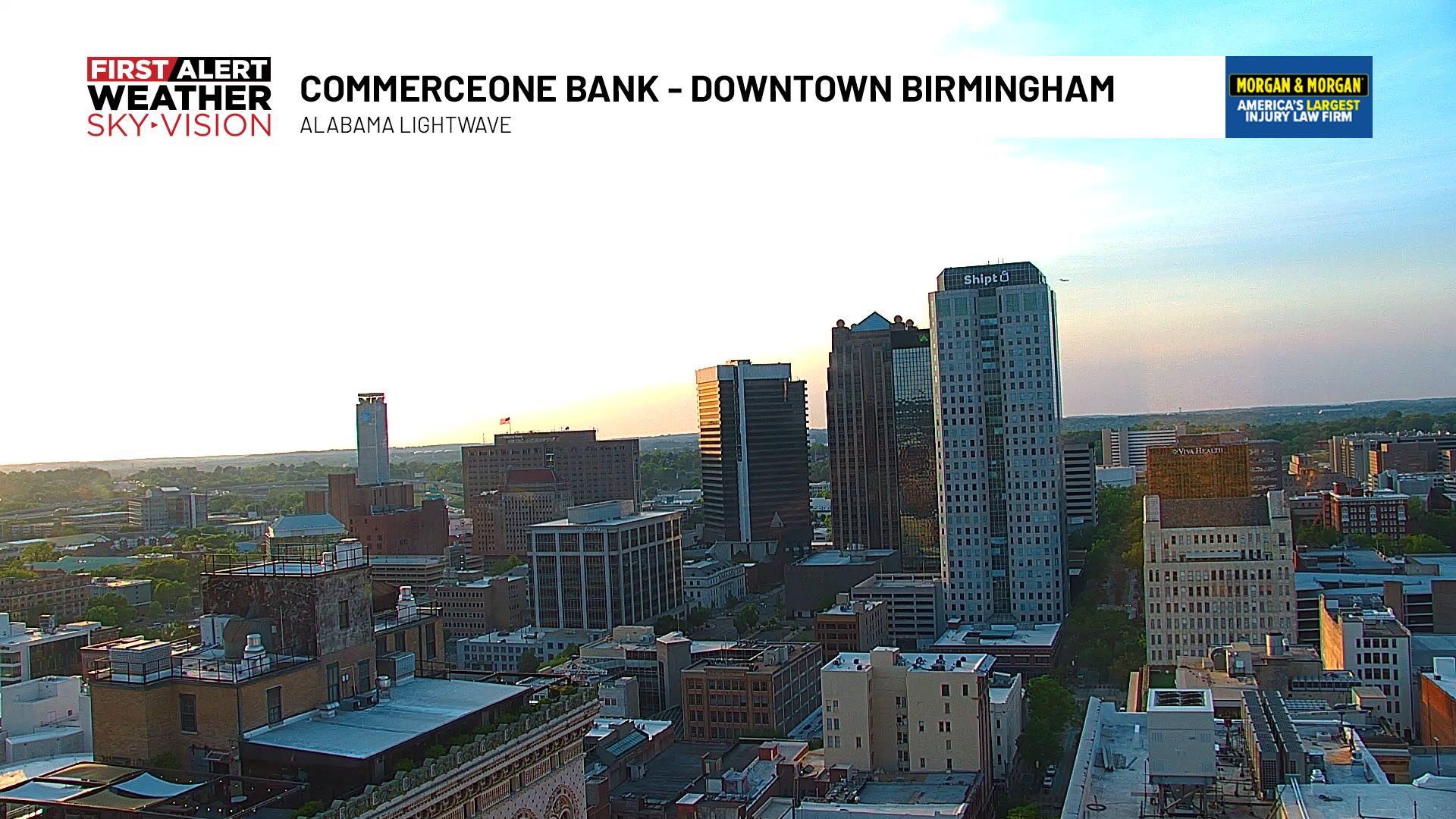 First Alert Sky Vision webcam shot of downtown Birmingham at sunrise, branded 'CommerceOne Bank, Downtown Birmingham, Alabama Lightwave.'